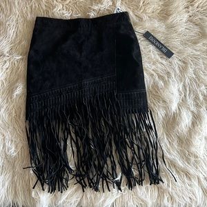Black suede mini skirt with fringe